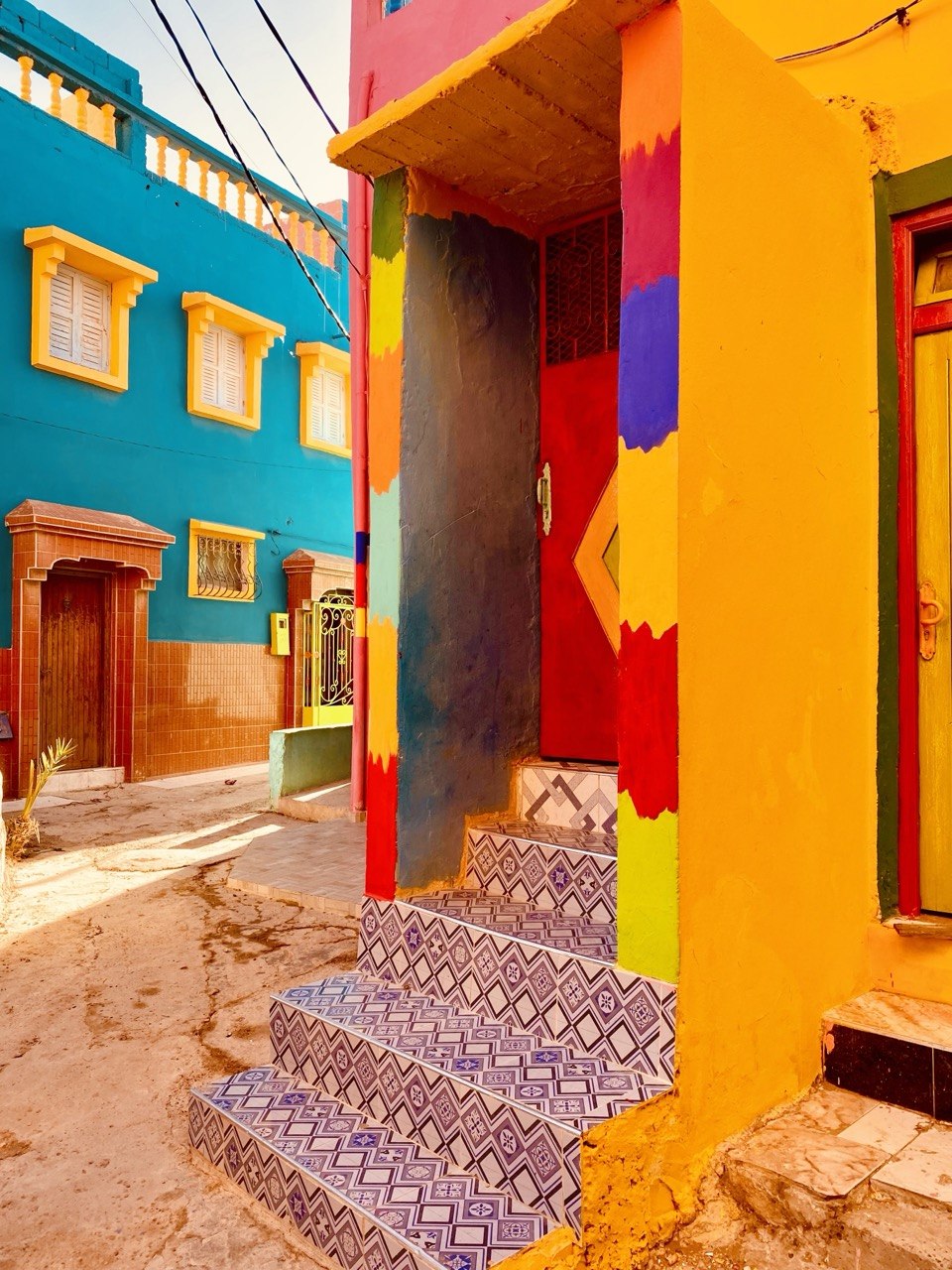 Colourful painted houses in Aghroud rainbow village