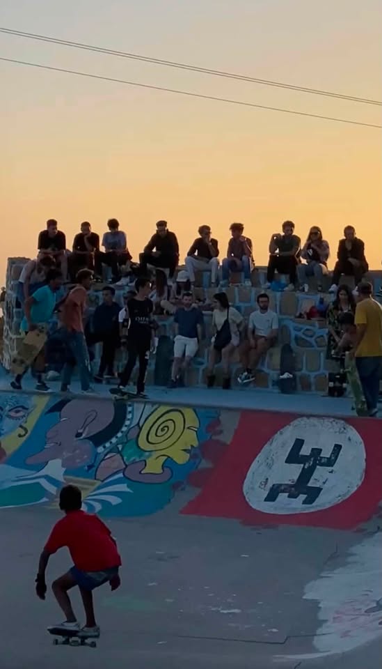 Taghazout skatepark bowl with ocean view at sunset